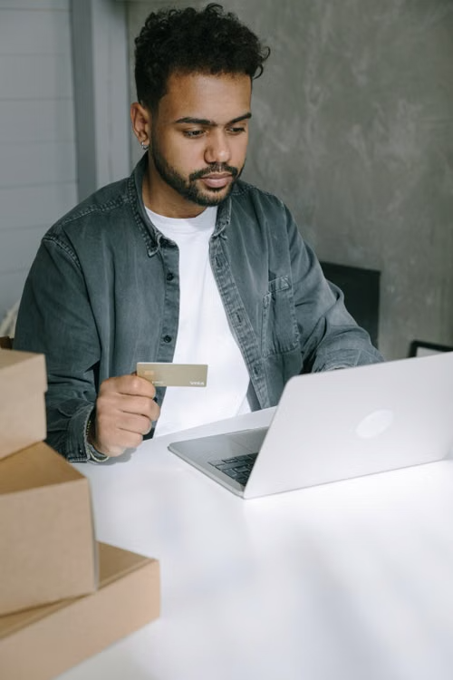 Person using secure fingerprint authentication for financial account protection