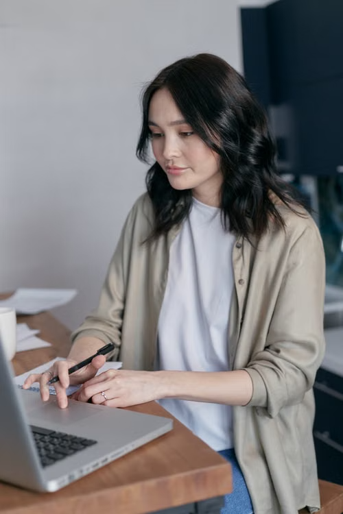 Professional reviewing personal financial plans and household budget